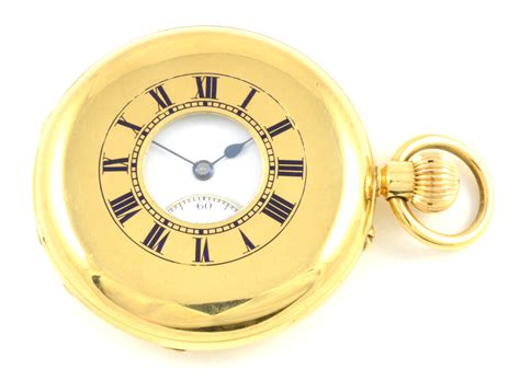 gold half hunter pocket watch value.